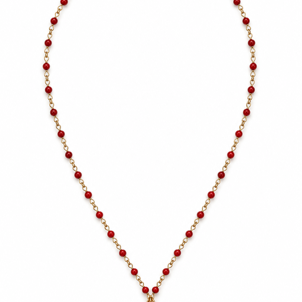 A gold chain necklace featuring small coral beads and a gold padlock pendant.