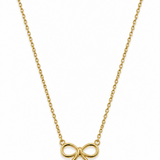 A delicate gold chain necklace featuring a small bow-shaped pendant.