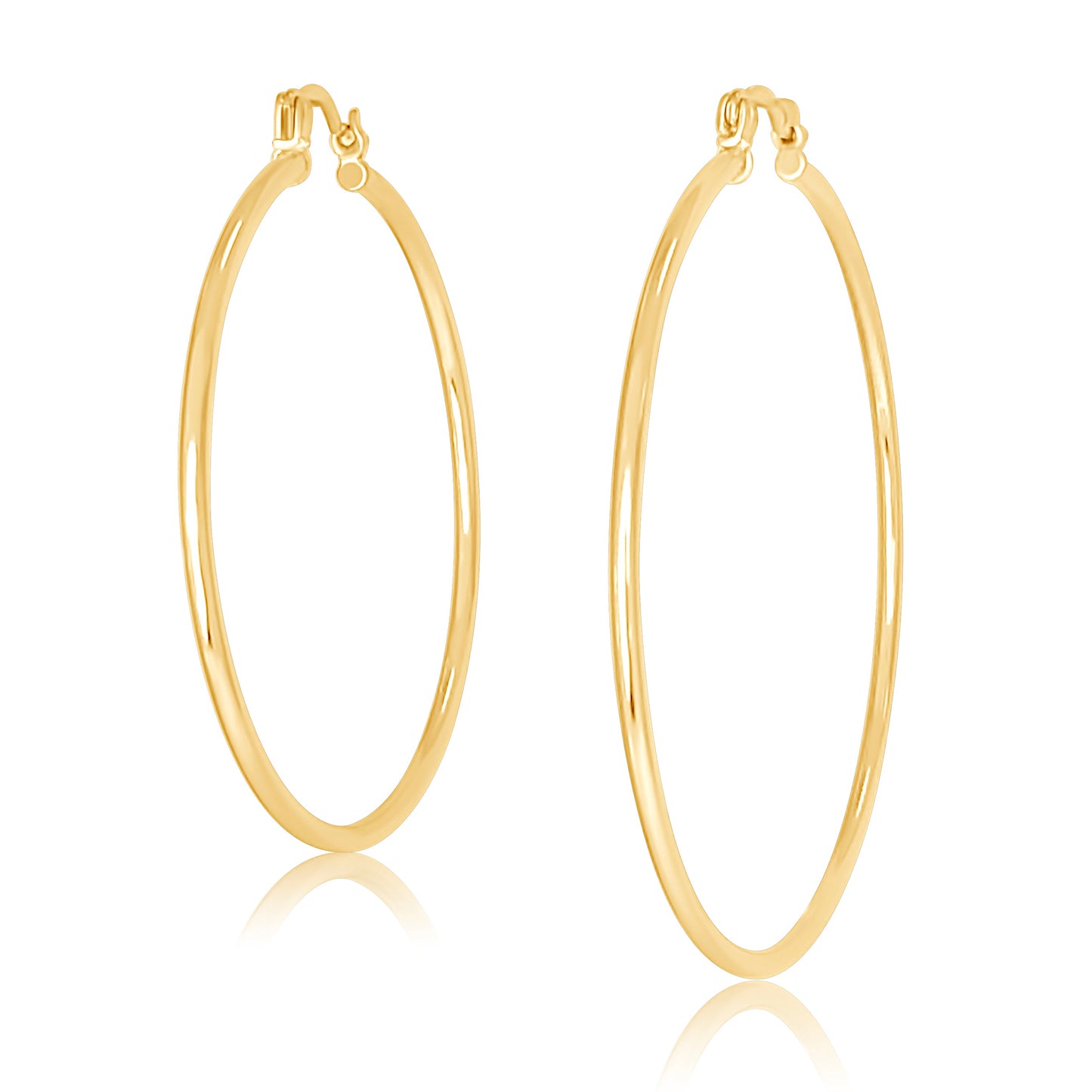 Gold hoop earrings on a white background