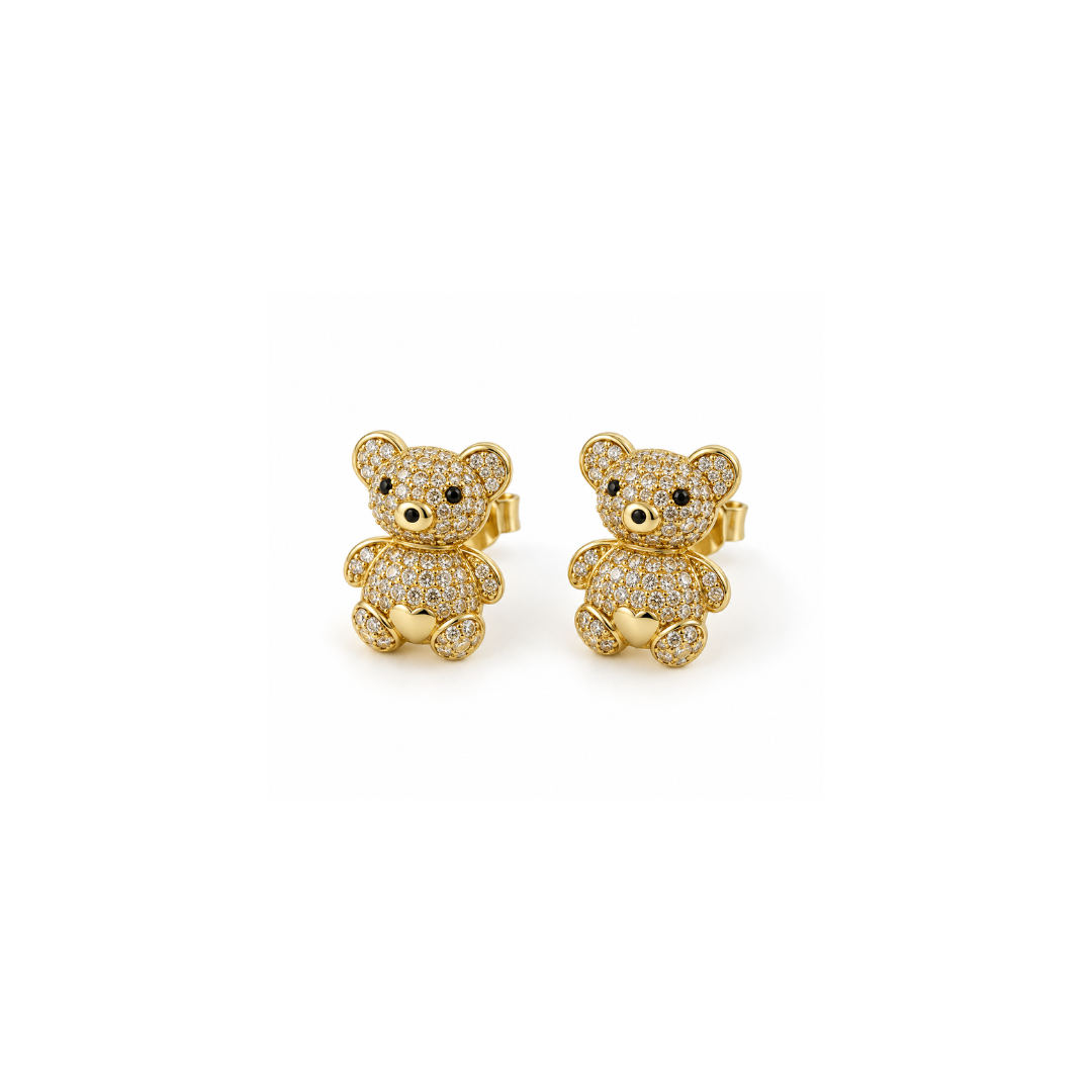 A pair of gold teddy bear stud earrings paved with small clear stones.