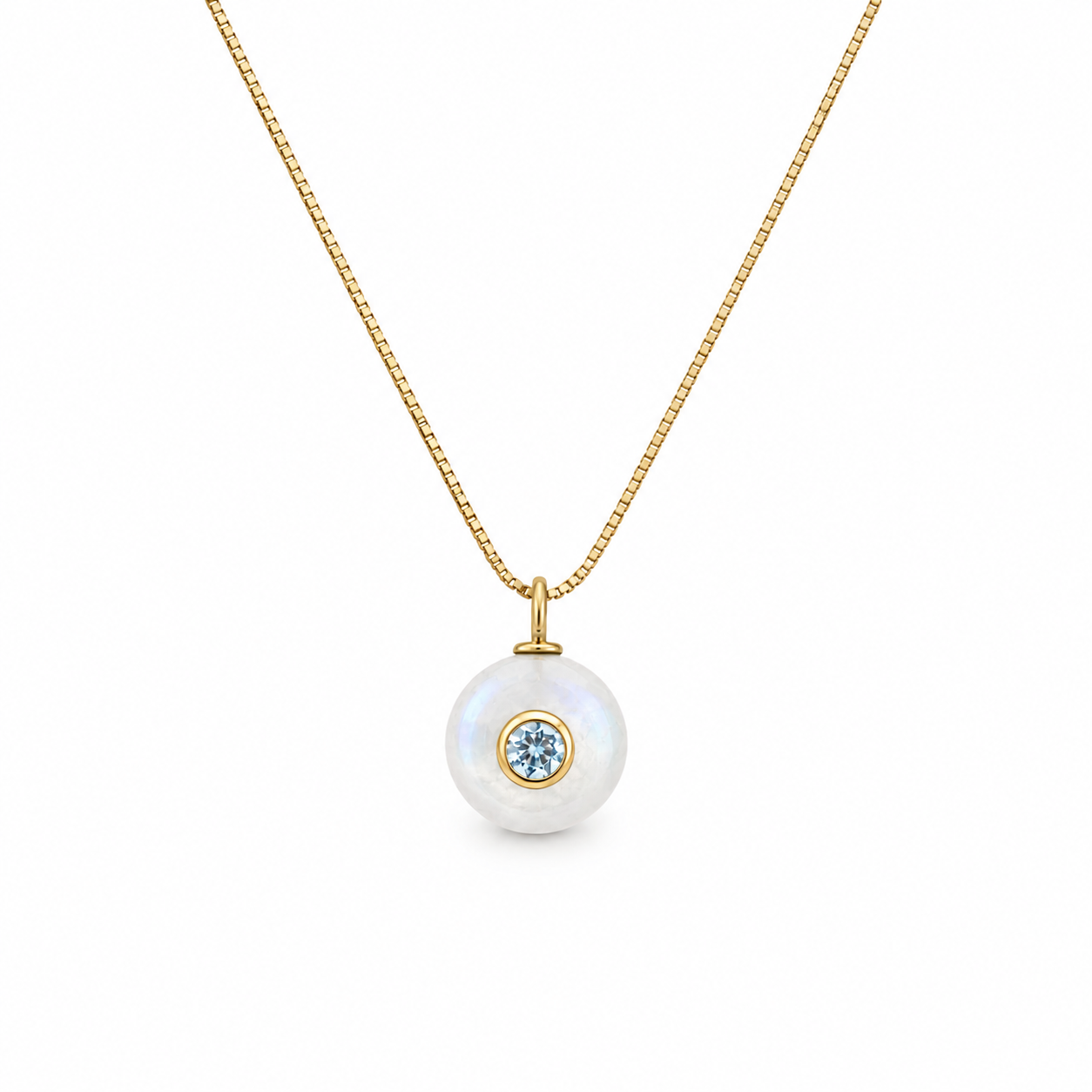 adjustable gold chain necklace with circular moonstone with light blue cz in the middle
