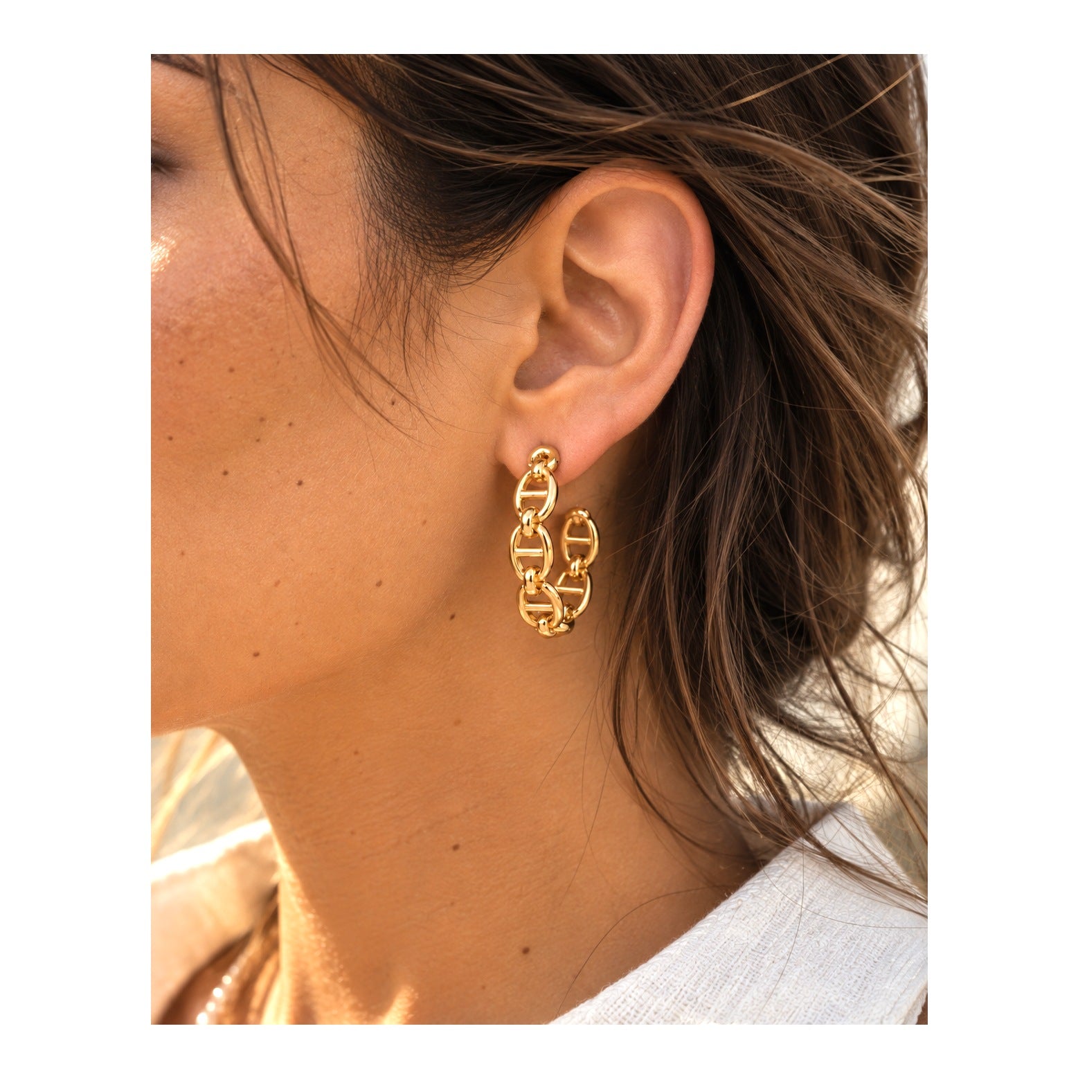 GENESIS gold earrings by ÍNDIGO